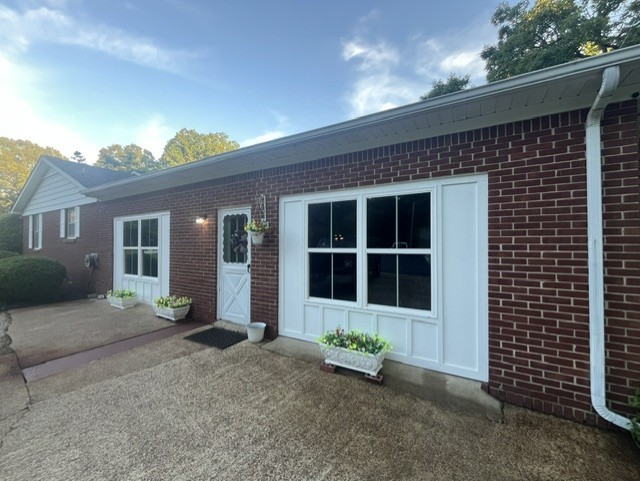 1386 Chisholm Road Cypress Inn, TN 38452 - Photo 58 of 58 a front view of a house with a yard