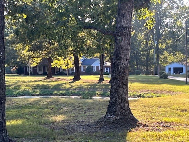 1386 Chisholm Road Cypress Inn, TN 38452 - Photo 8 of 58 a view of swimming pool with large trees and plants