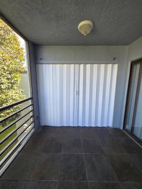 9440 Southwest 8th Street, Unit 417 Boca Raton, FL 33428 - Photo 19 of 21 a view of a back yard from a balcony