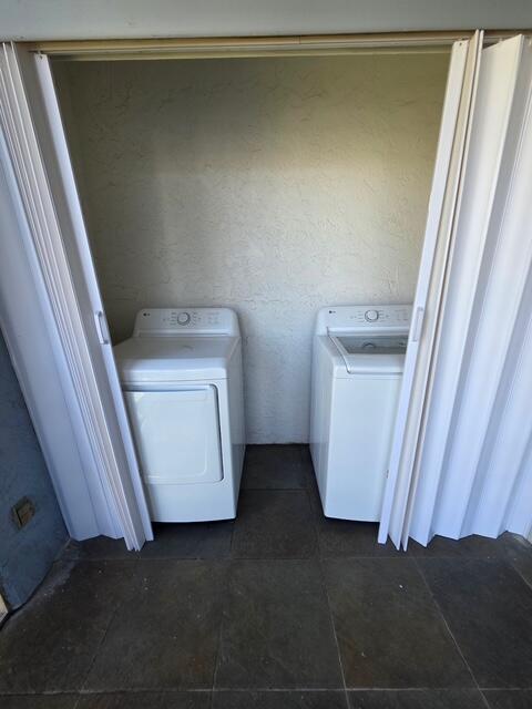 9440 Southwest 8th Street, Unit 417 Boca Raton, FL 33428 - Photo 20 of 21 a utility room with a washer and dryer