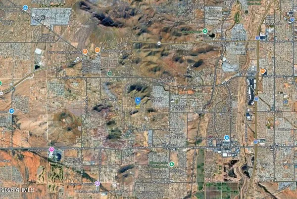 a aerial view of a house with a yard