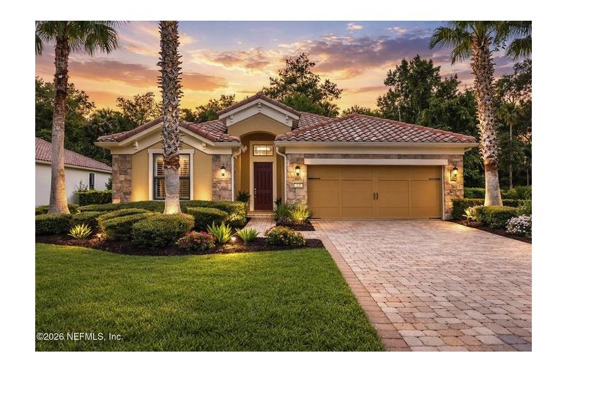 a view of a front of a house with a yard