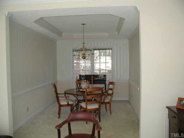 4432 Pike Road Raleigh, NC 27613 - Photo 3 of 10 a dining room with furniture and window