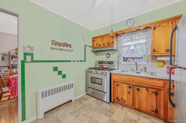 a storage room with cabinets and window