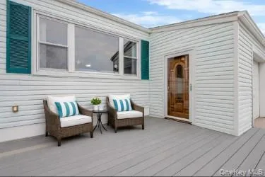 a view of a patio with furniture and a couch