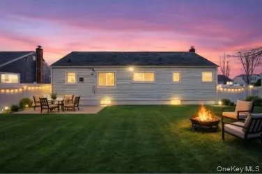 a front view of a house with patio