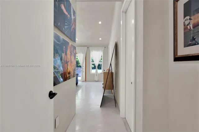 a view of a hallway with a furniture