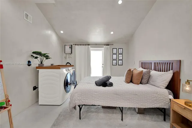 a bedroom with furniture and a couch