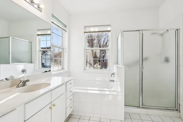a bathroom with a sink and a bathtub