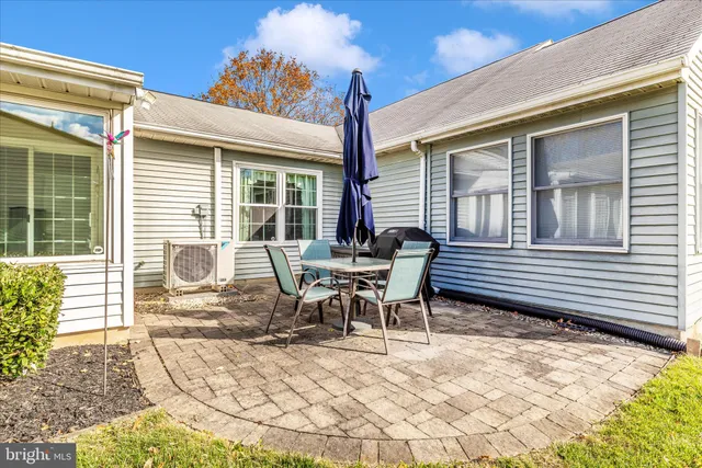 a view of a house with patio