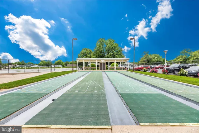 an aerial view of a house with a lake view