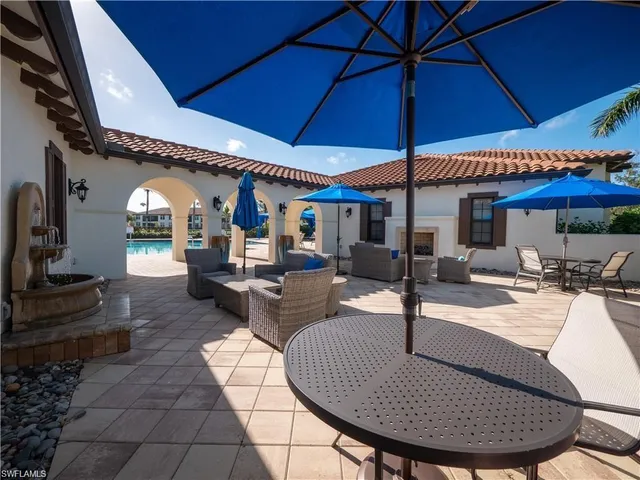 a outdoor space with lots of tables and chairs