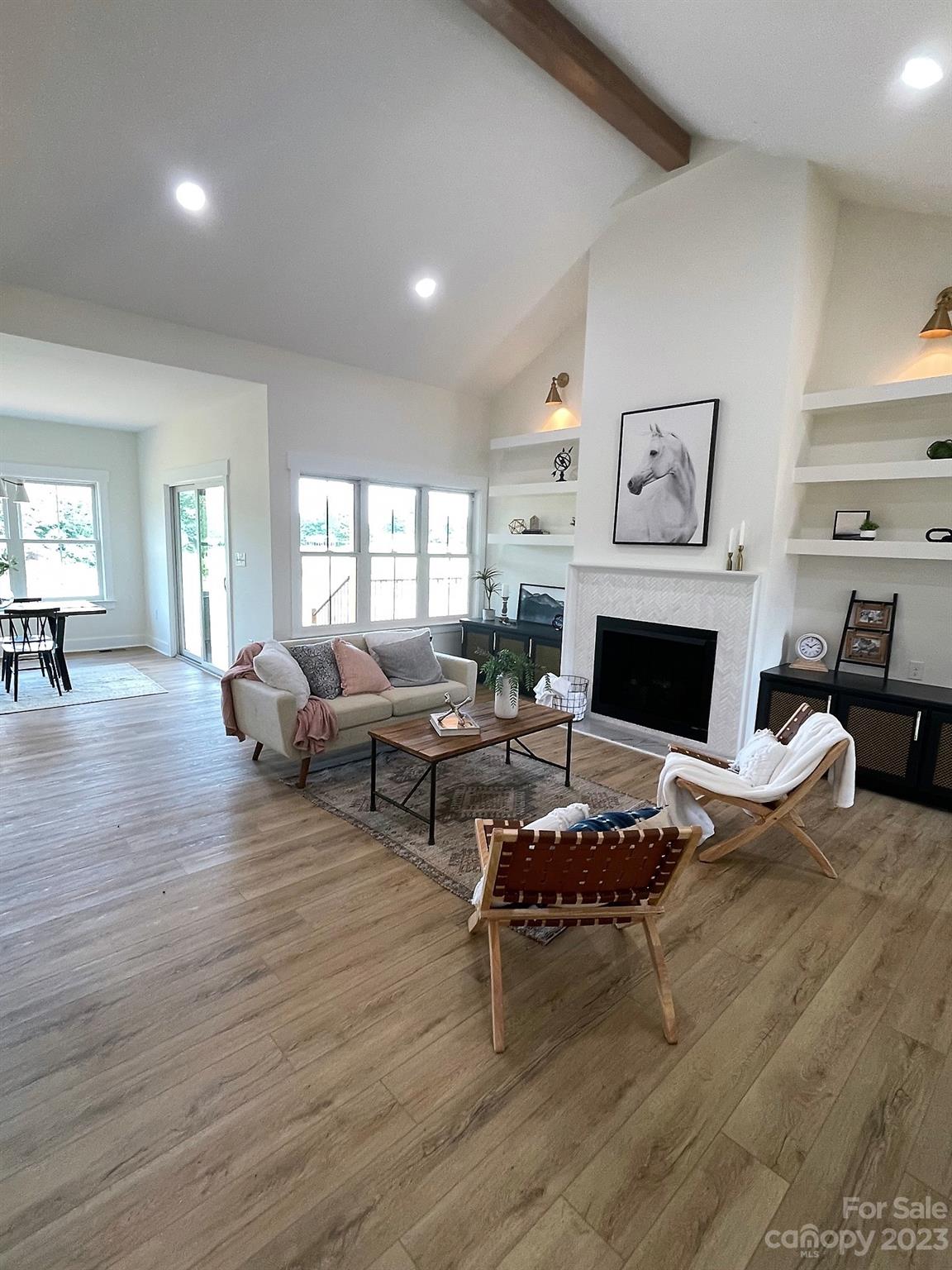 215 Cal Kennedy Road Cleveland, NC 27013 - Photo 11 of 39 a living room with furniture and a fireplace