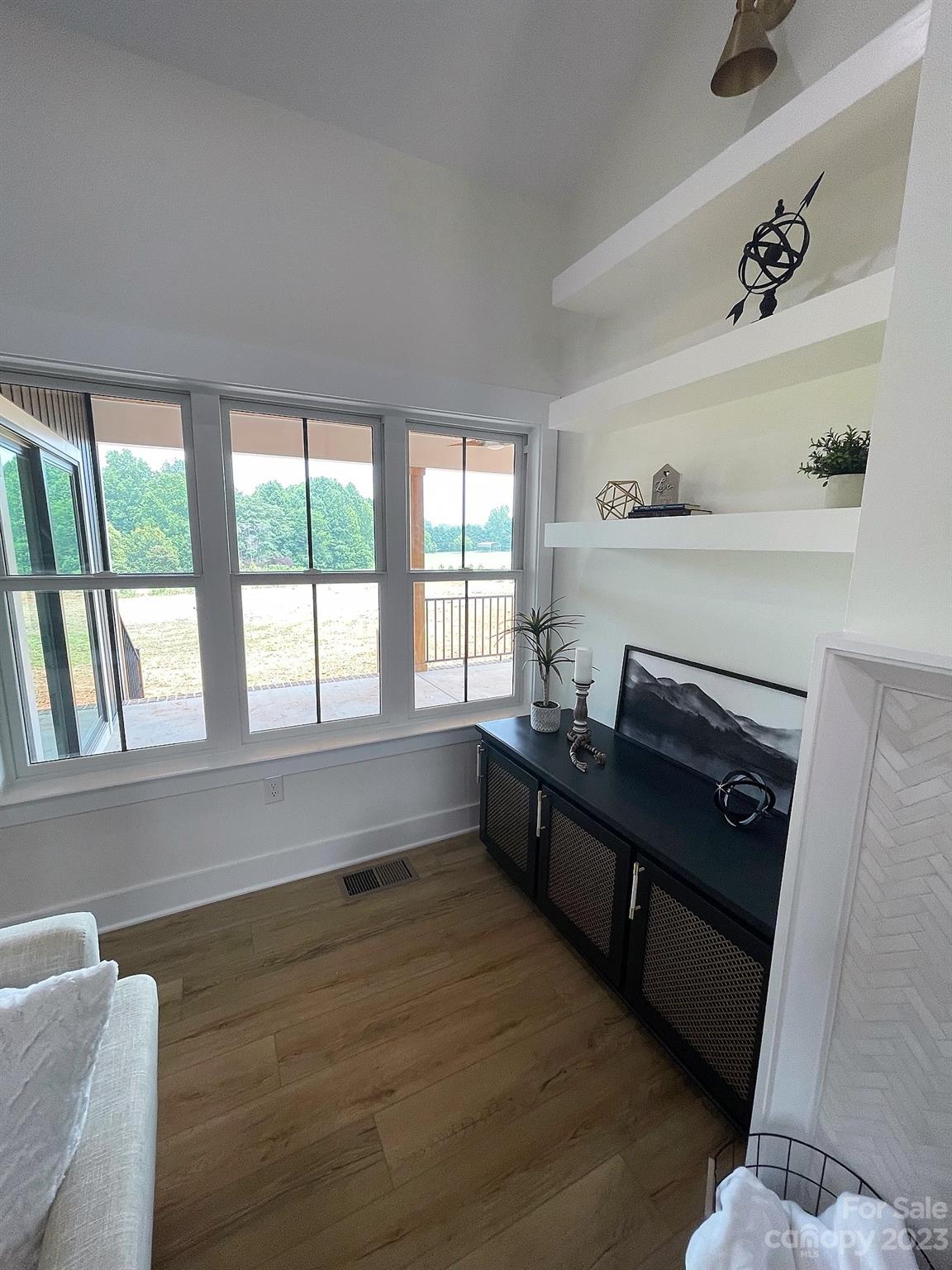 215 Cal Kennedy Road Cleveland, NC 27013 - Photo 13 of 39 a kitchen with granite countertop a stove and a sink