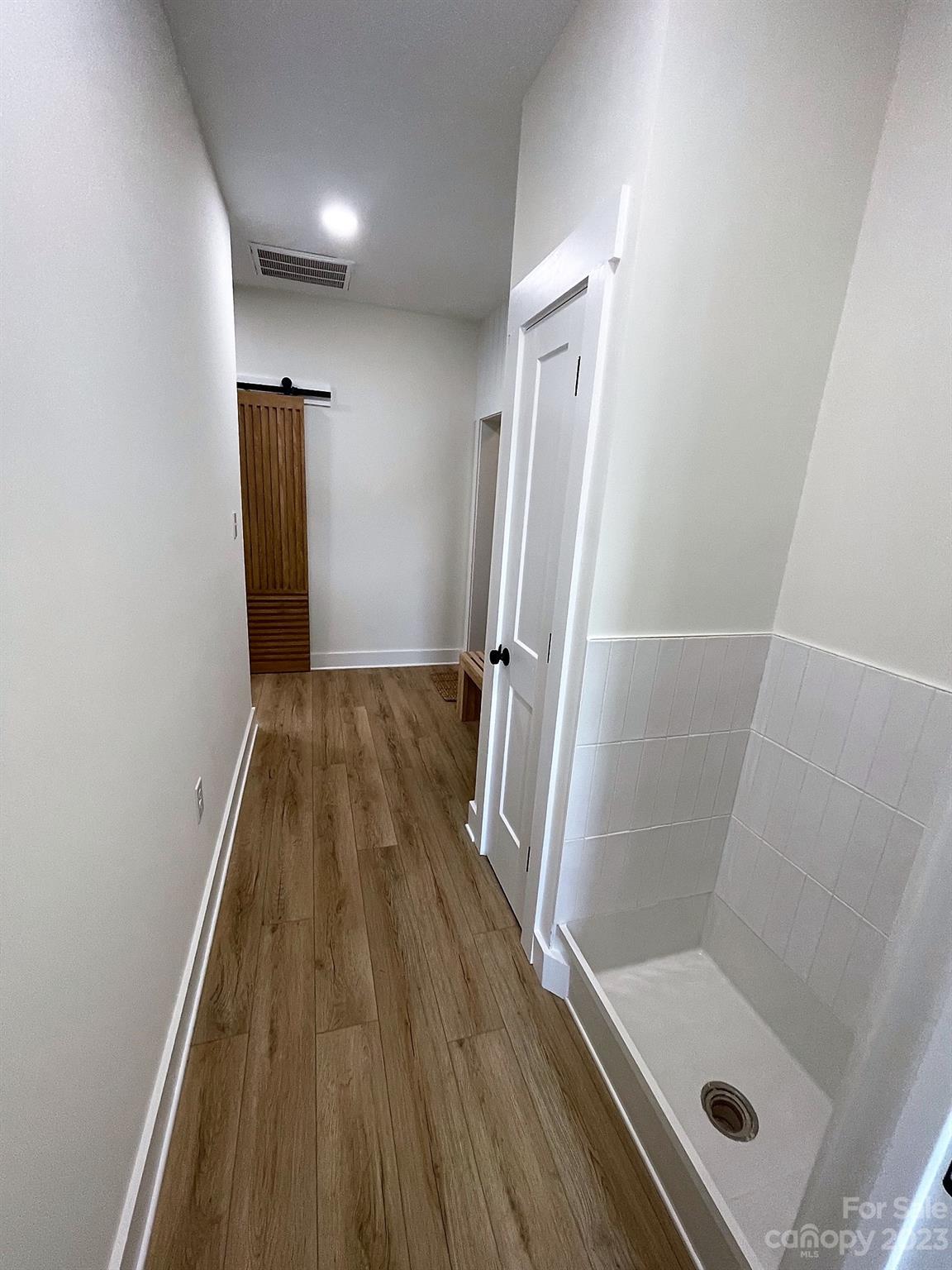215 Cal Kennedy Road Cleveland, NC 27013 - Photo 27 of 39 a bathroom with a sink and shower