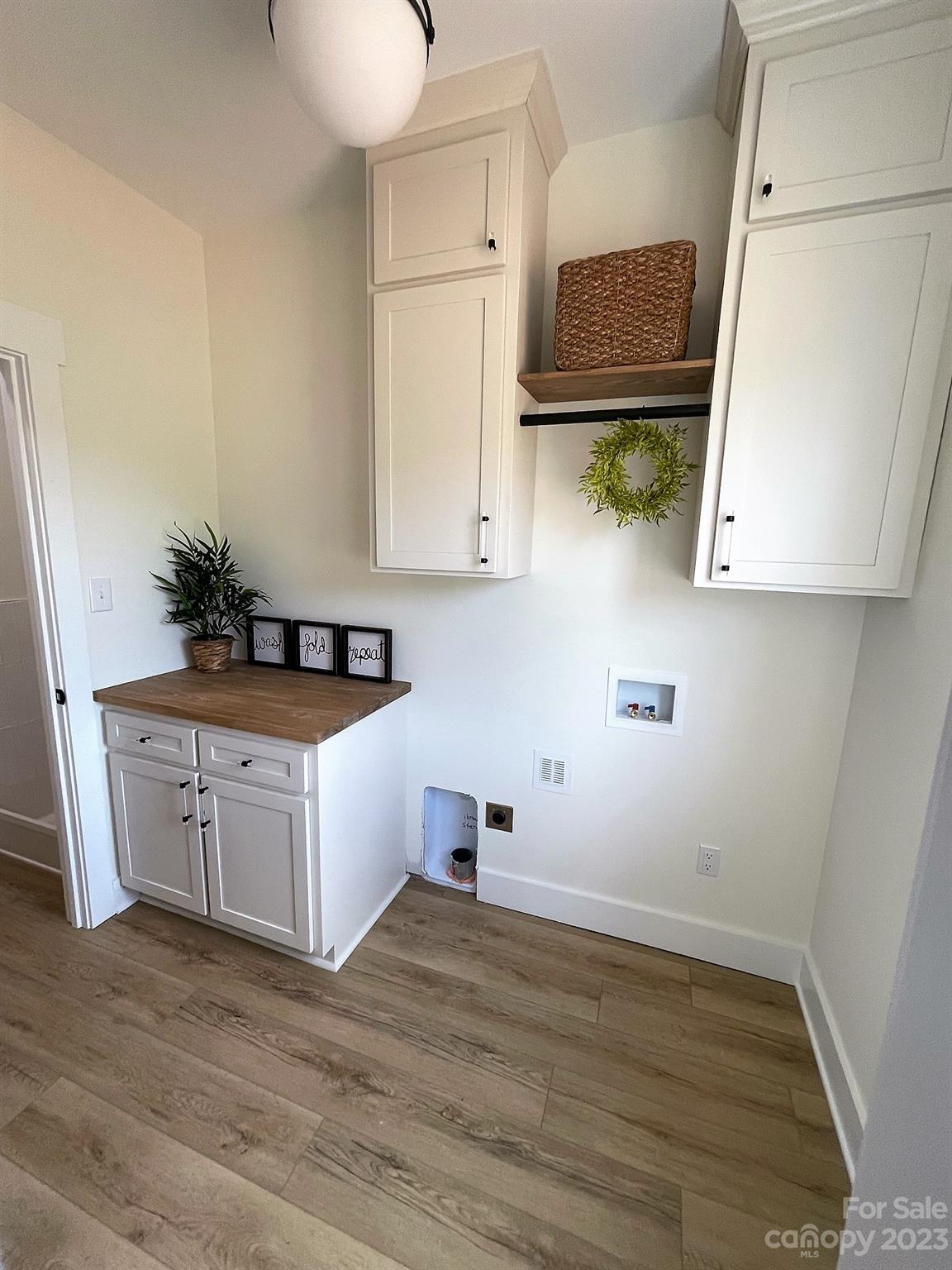 215 Cal Kennedy Road Cleveland, NC 27013 - Photo 34 of 39 a kitchen with a sink and cabinets