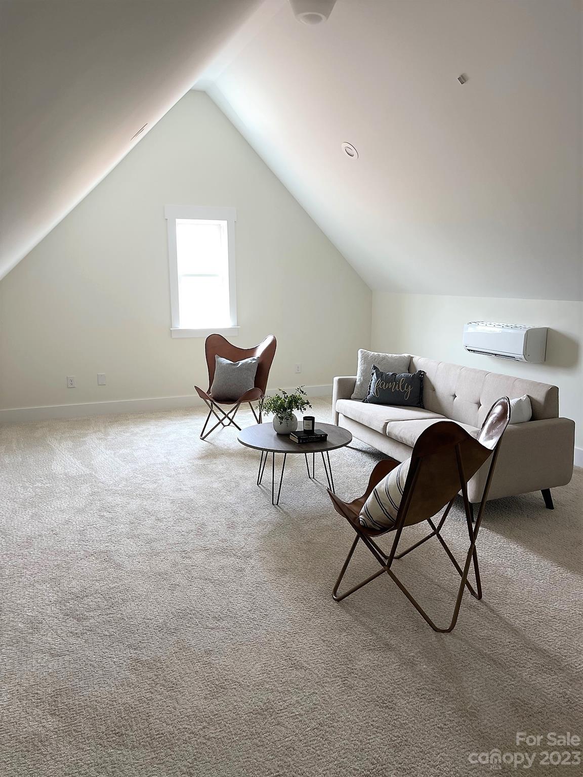 215 Cal Kennedy Road Cleveland, NC 27013 - Photo 38 of 39 a living room with furniture and a chair