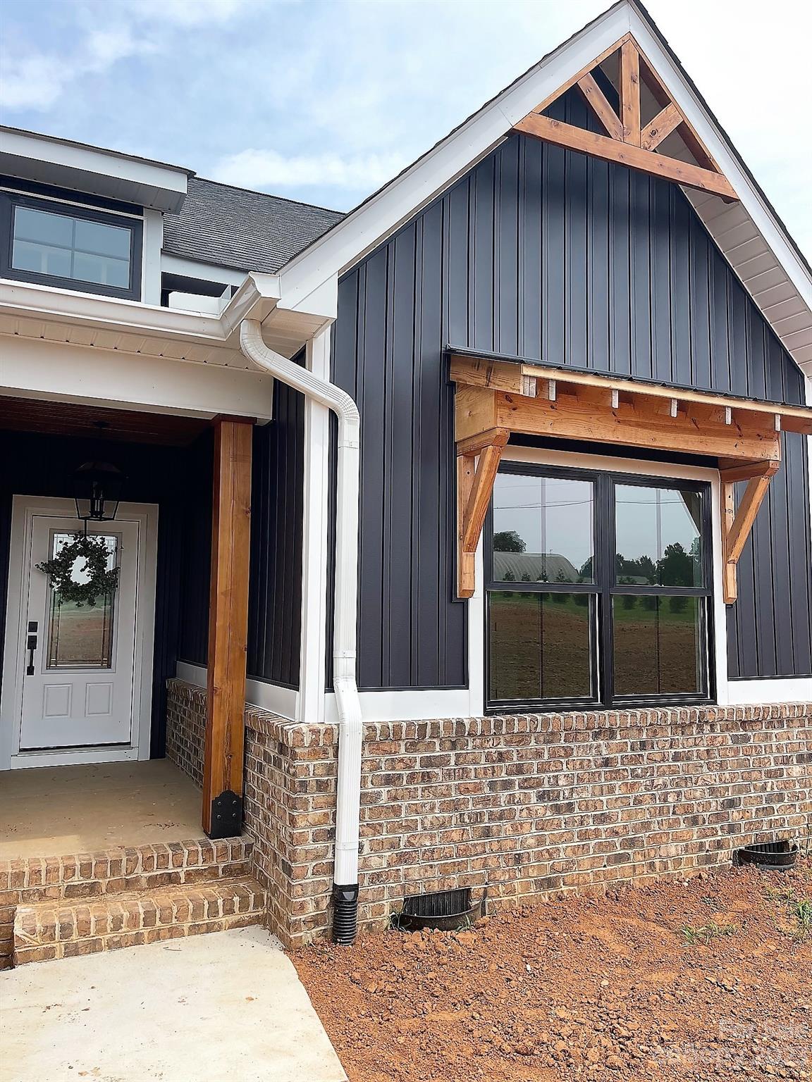 215 Cal Kennedy Road Cleveland, NC 27013 - Photo 6 of 39 a backyard of a house with seating area