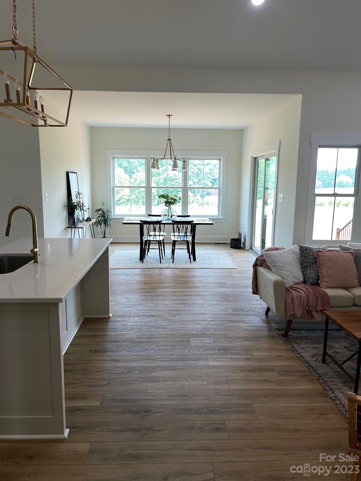 215 Cal Kennedy Road Cleveland, NC 27013 - Photo 10 of 39 a living room with furniture and a large window