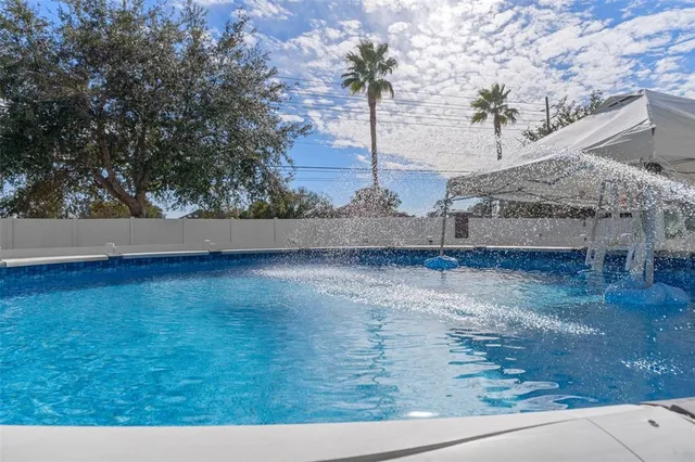 a terrace view with table and chairs potted plants