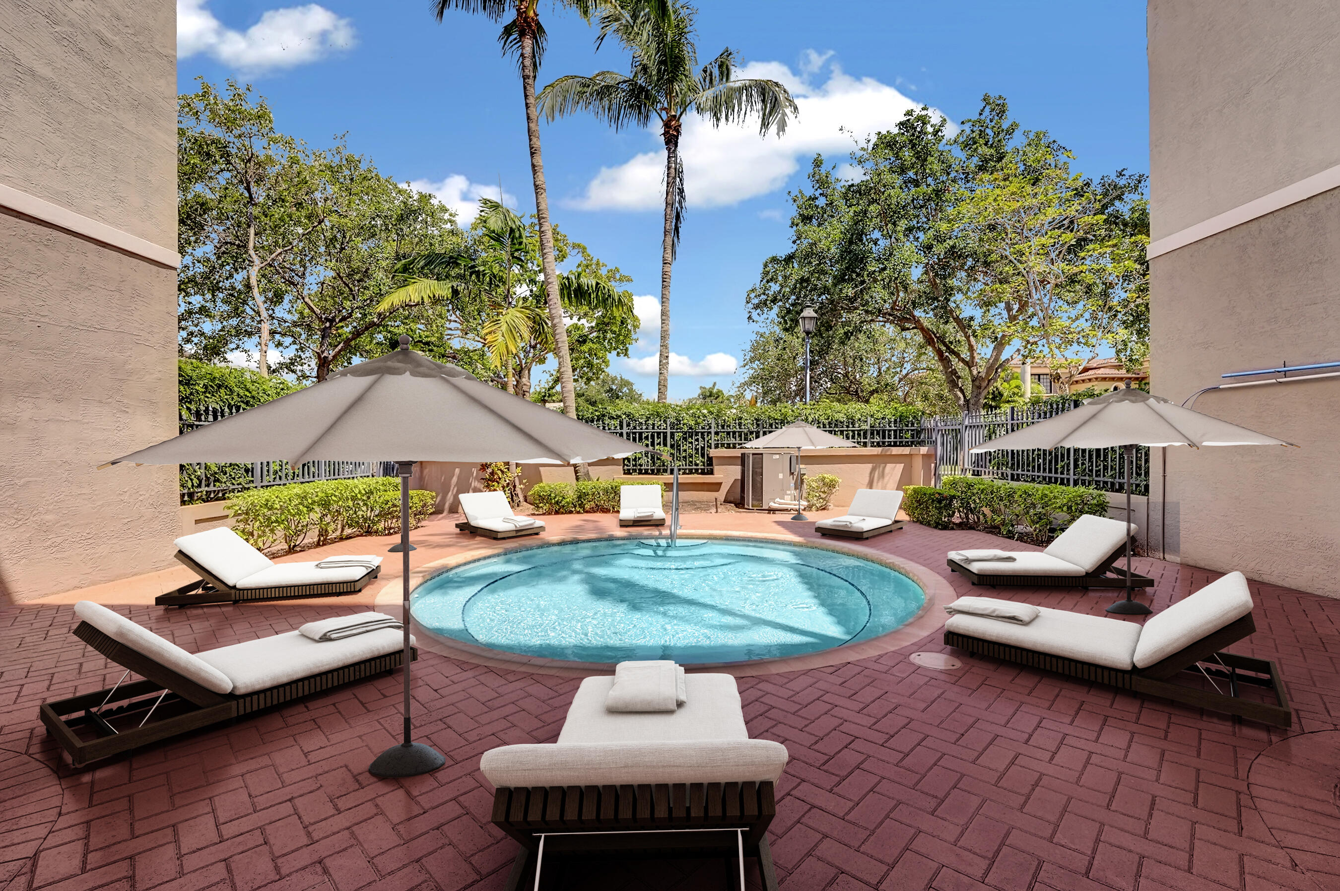 462 East Boca Raton Road Boca Raton, FL 33432 - Photo 32 of 43 a backyard of a house with table and chairs