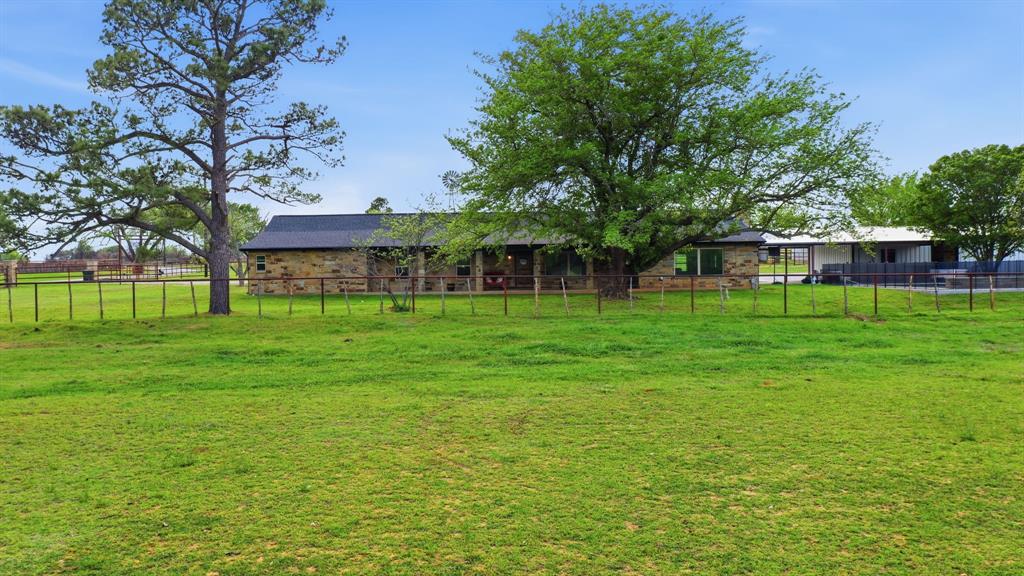 187 County Road 4195 Decatur, TX 76234 - Photo 37 of 40 a view of a house with a big yard