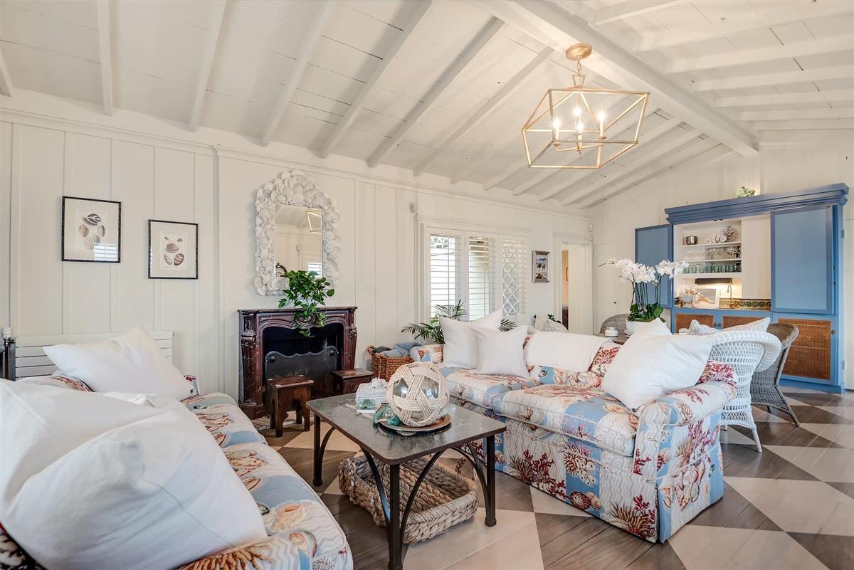 759 Las Olas Drive Aptos, CA 95003 - Photo 20 of 50 a living room with furniture and a chandelier