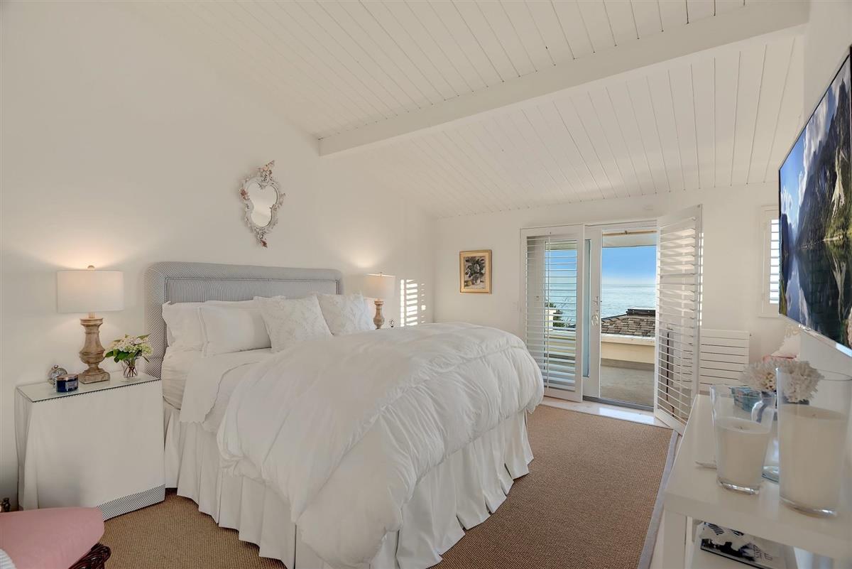 759 Las Olas Drive Aptos, CA 95003 - Photo 27 of 50 a bedroom with a bed and a cabinets