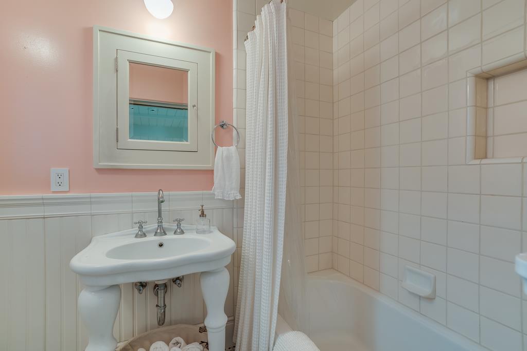 759 Las Olas Drive Aptos, CA 95003 - Photo 40 of 50 a bathroom with a sink mirror and toilet