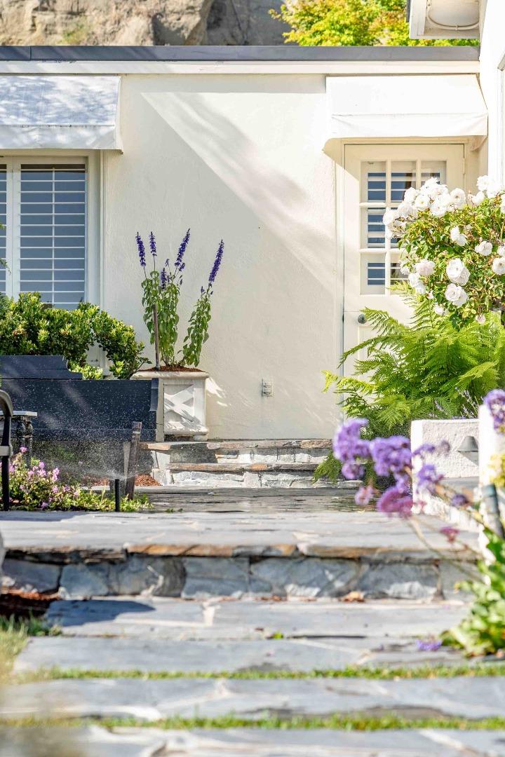 759 Las Olas Drive Aptos, CA 95003 - Photo 41 of 50 a potted plant sitting on the side of a building