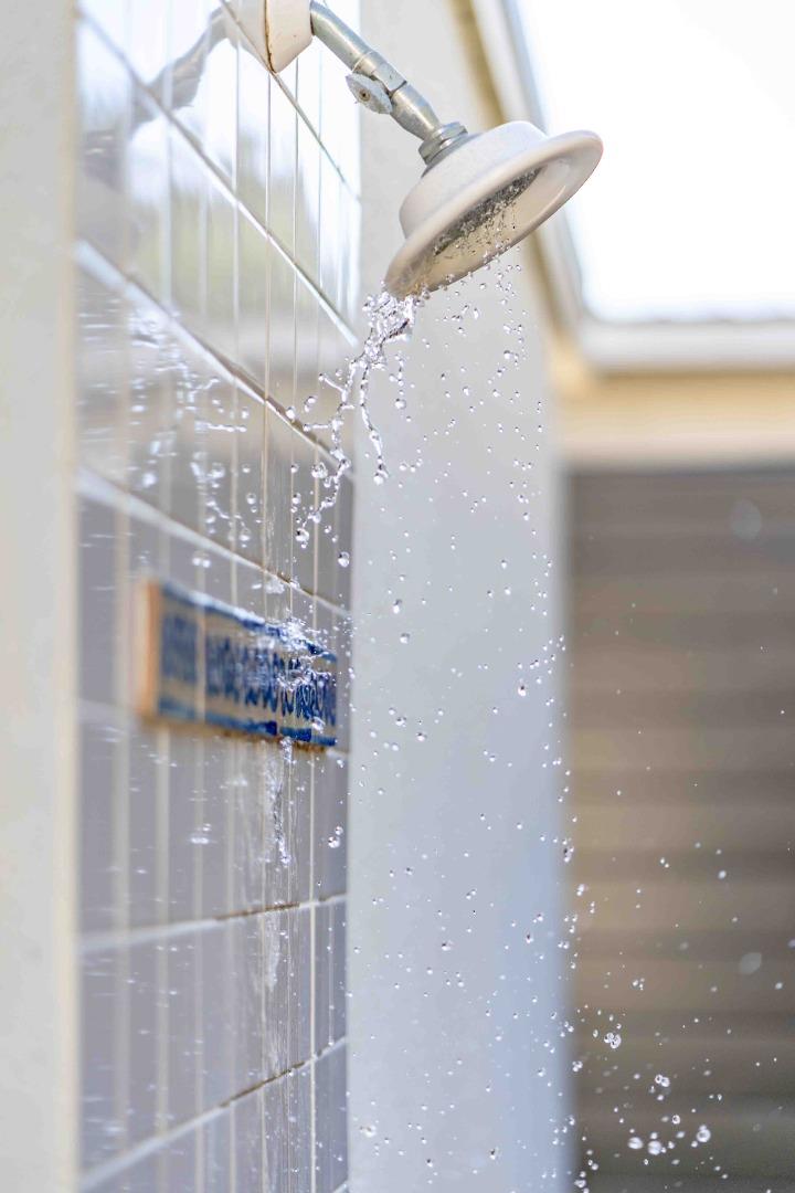759 Las Olas Drive Aptos, CA 95003 - Photo 47 of 50 a bathroom with a glass shower door and a shower