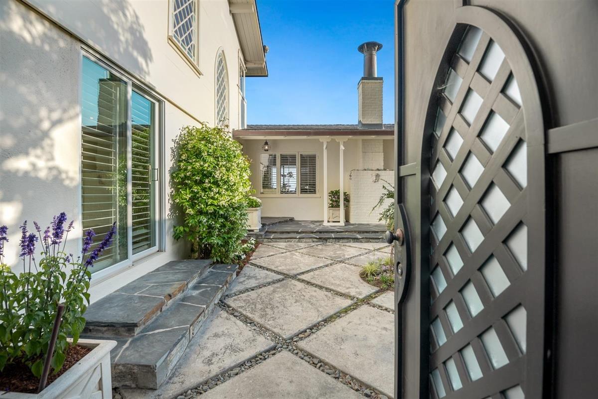759 Las Olas Drive Aptos, CA 95003 - Photo 6 of 50 a front view of a house with a garden
