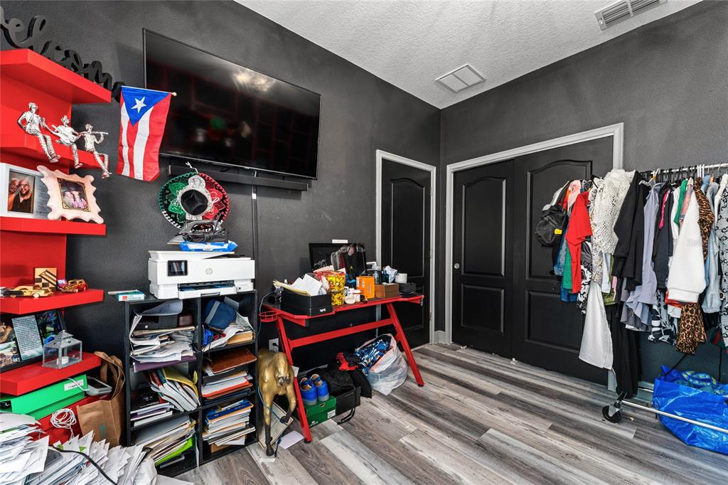 3199 Crispin Circle Harmony, FL 34773 - Photo 24 of 37 a view of a chairs in a room