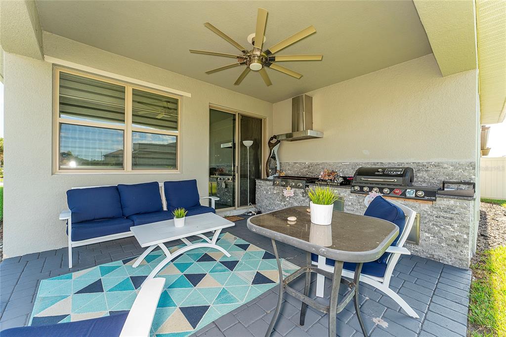 3199 Crispin Circle Harmony, FL 34773 - Photo 28 of 37 a living room with furniture and a table