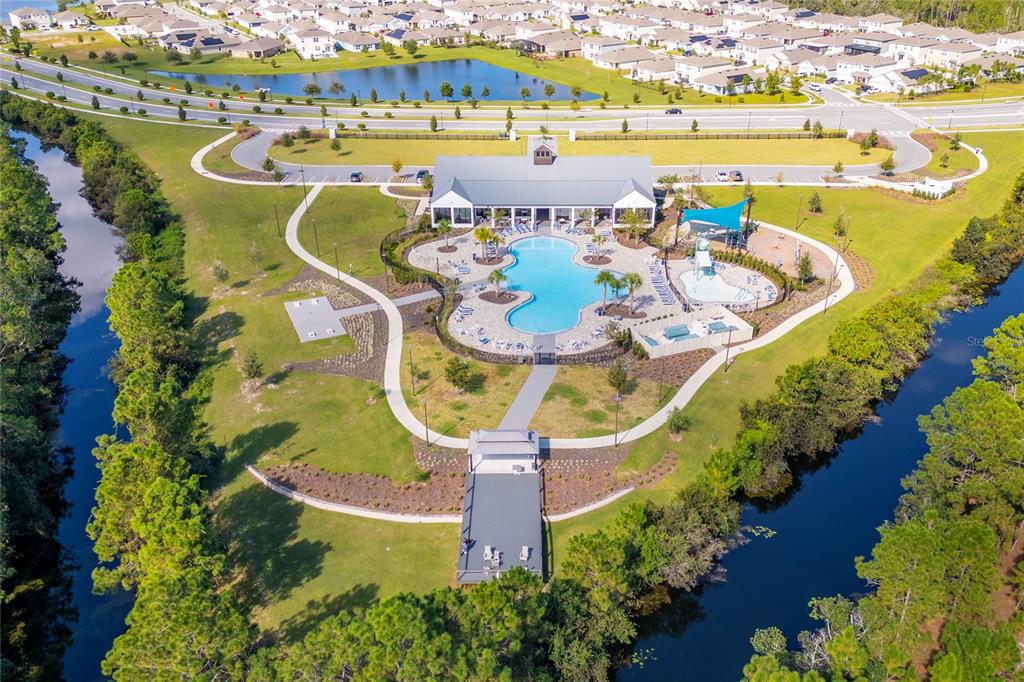 3199 Crispin Circle Harmony, FL 34773 - Photo 37 of 37 an aerial view of a house with outdoor seating swimming pool and ocean view
