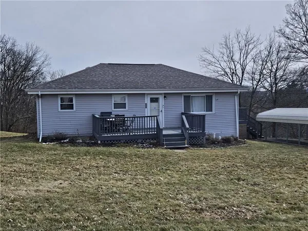 a house view with a garden space