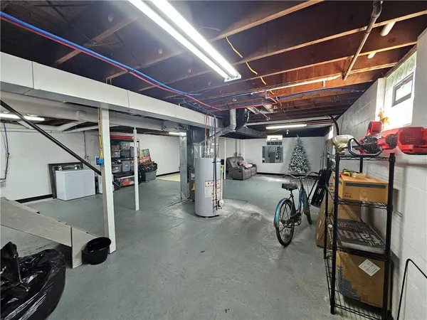 a view of a empty room with lot of furniture
