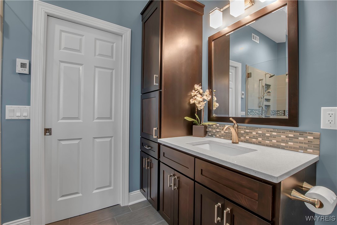 285 Enchanted Forest North Lancaster, NY 14086 - Photo 30 of 50 Primary bath w/custom built cabinets by Paul Reile