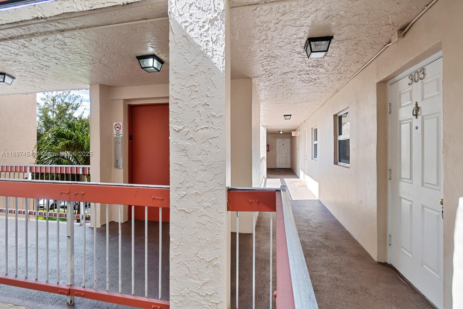 9451 Evergreen Place, Unit 303 Davie, FL 33324 - Photo 6 of 23 a balcony view with a outdoor space