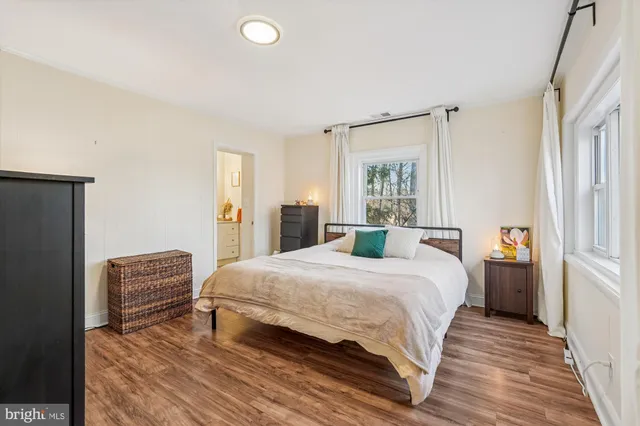 a bedroom with a bed and a closet