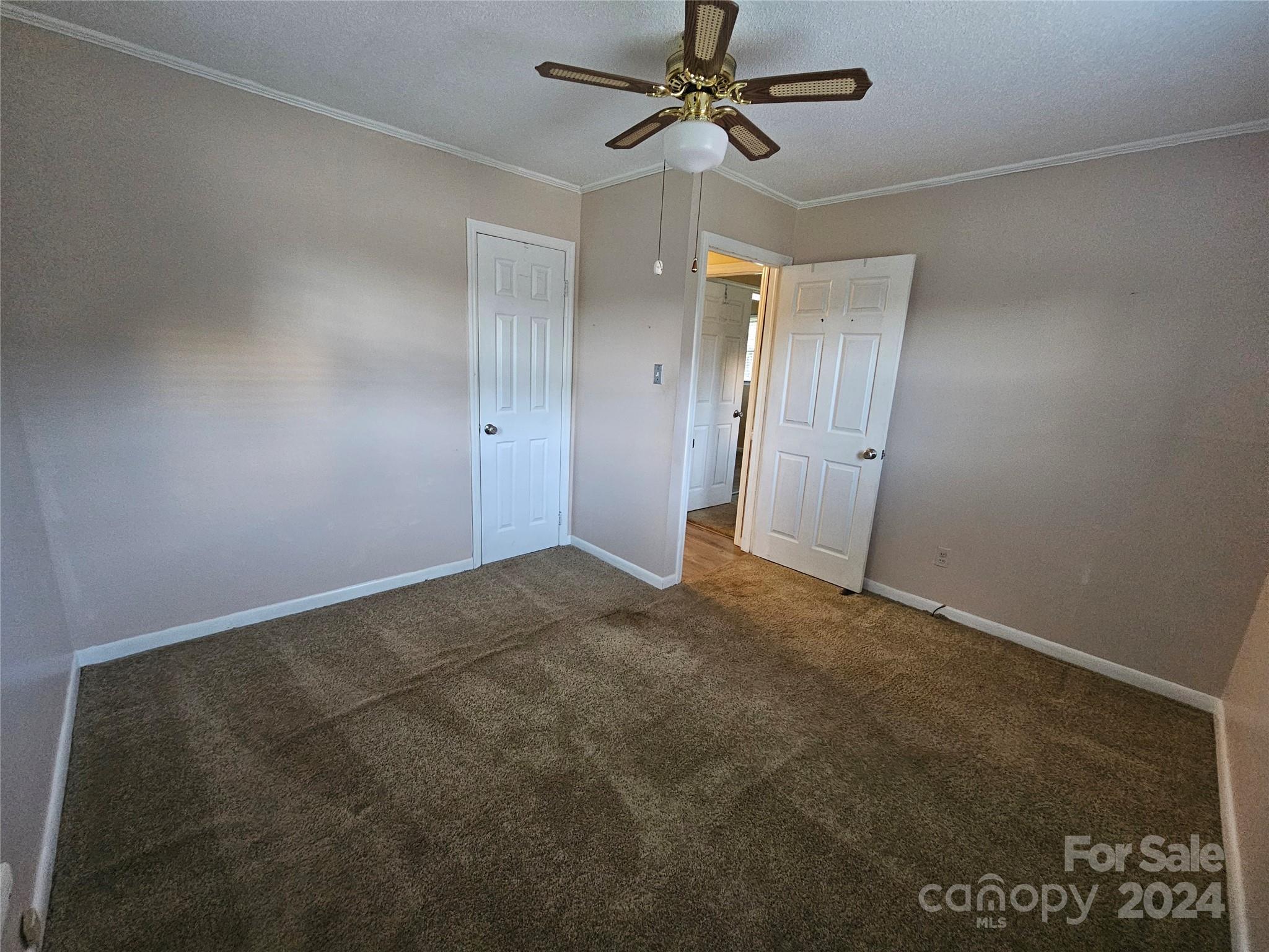 1784 Deaton Drive Lancaster, SC 29720 - Photo 16 of 19 a view of a big room with wooden floor and windows in a room
