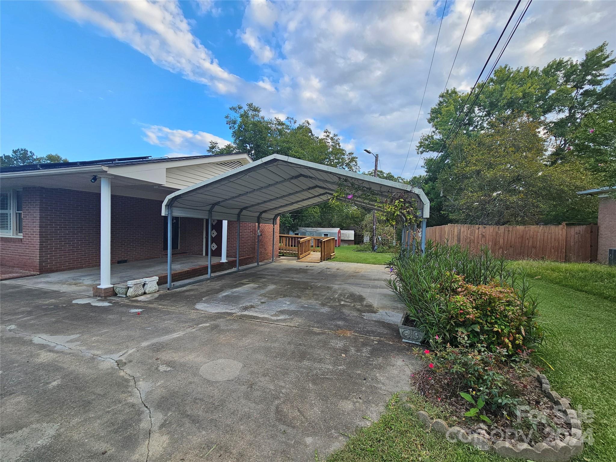 1784 Deaton Drive Lancaster, SC 29720 - Photo 17 of 19 a front view of a house with garden