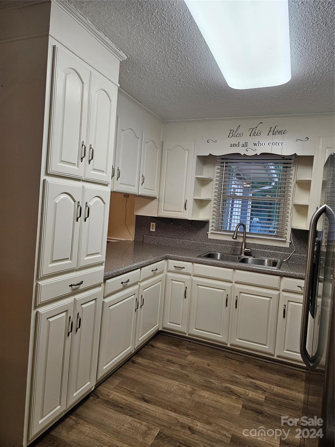 1784 Deaton Drive Lancaster, SC 29720 - Photo 6 of 19 a kitchen with stainless steel appliances granite countertop a sink and cabinets