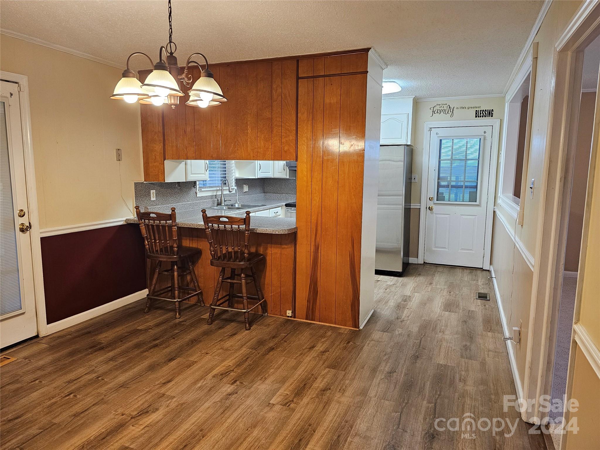 1784 Deaton Drive Lancaster, SC 29720 - Photo 8 of 19 a view of a dining room with furniture window and wooden floor