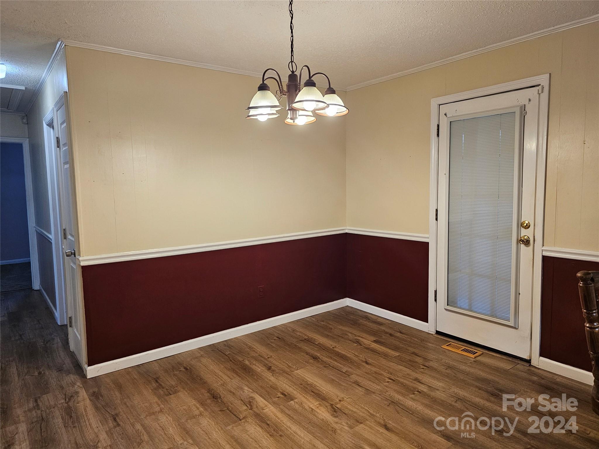 1784 Deaton Drive Lancaster, SC 29720 - Photo 9 of 19 a view of empty room with wooden floor and fan