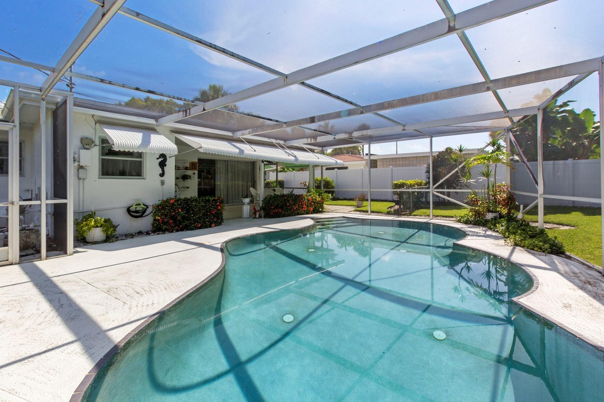 616 Southwest 2nd Street Boca Raton, FL 33486 - Photo 2 of 13 Screened Pool