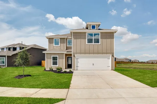 a front view of house with yard
