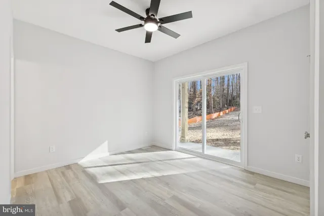 a bathroom with a sink a toilet and a bathtub