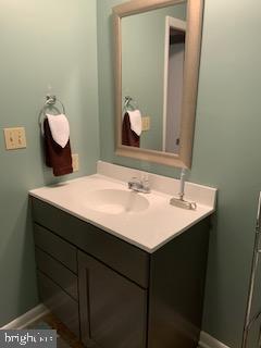 102 Bunker Hill Road New Cumberland, PA 17070 - Photo 17 of 23 a bathroom with a sink vanity and a mirror