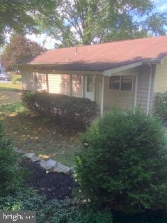 102 Bunker Hill Road New Cumberland, PA 17070 - Photo 20 of 23 a front view of a house with yard